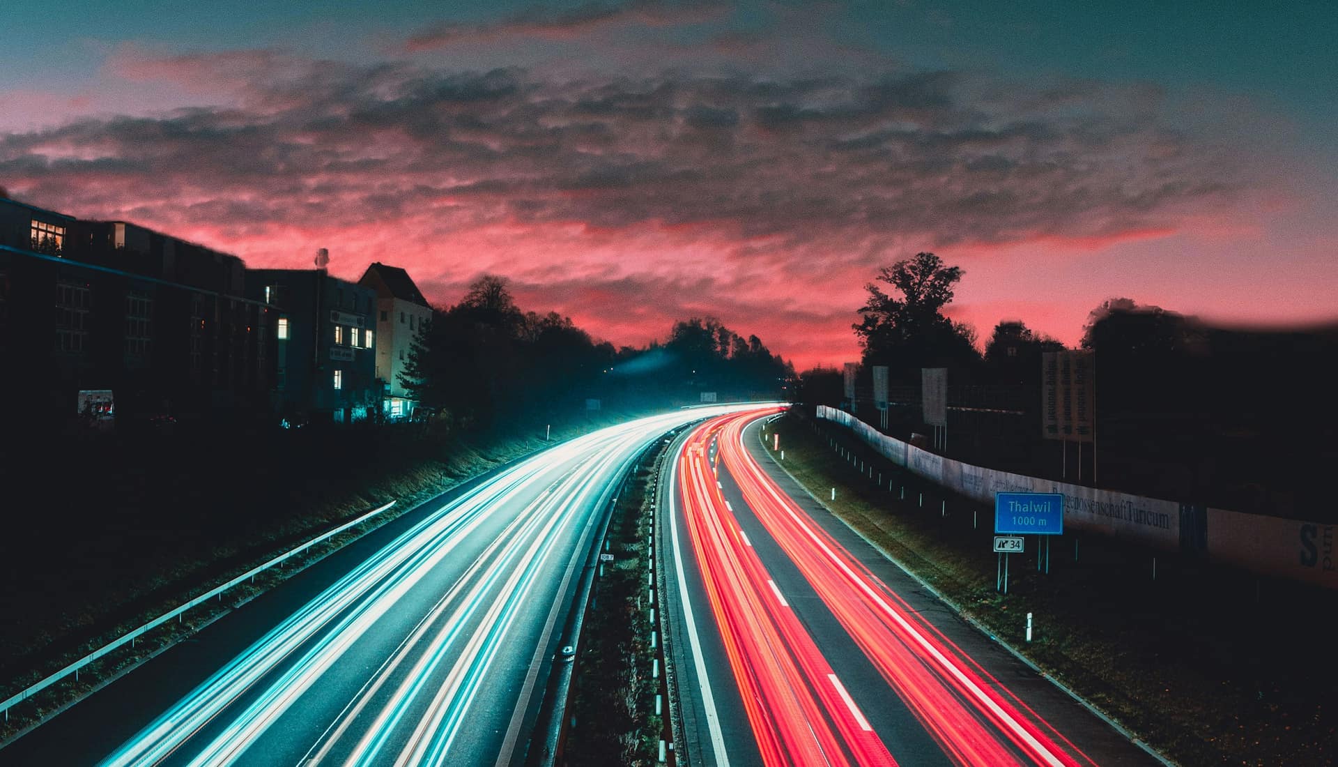 Abstract night highway light trails representing data flow